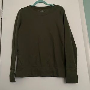 Olive green crewneck sweatshirt. Size Large but fits like a medium